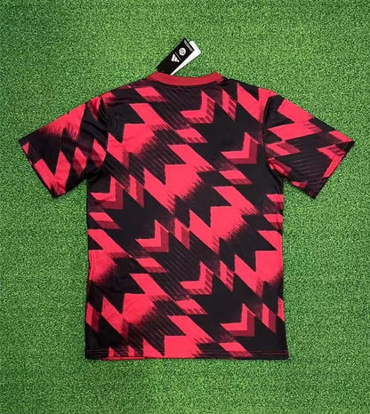 Maglia da calcio rossa e nera del Manchester United 2025/2026, allenamento