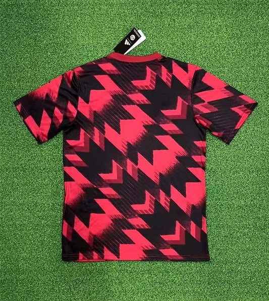 Maglia da calcio rossa e nera del Manchester United 2025/2026, allenamento